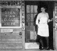 Isaac Wooward with Mother showing his gouged out eyes for using a White only bathroom.